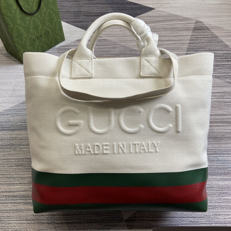 G*u*i shopping bags